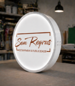 Caixa luminosa redonda uma face